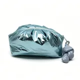 Metallic Ice Blue Puffy Makeup Bag with Knot Charm – view 2